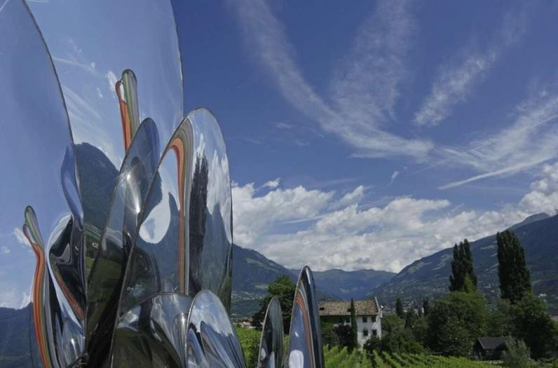 Nestled in fields and vineyards in the mountainside panorama of South Tyrol. Nestled in fields and vineyards in the mountainside panorama of South Tyrol.