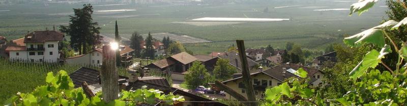 Nestled in fields and vineyards in the mountainside panorama of South Tyrol. Nestled in fields and vineyards in the mountainside panorama of South Tyrol.
